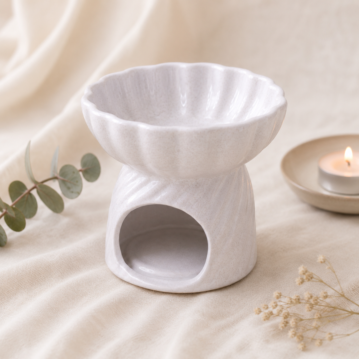Shell-shaped ceramic wax melt burner by Simple Soaps UAE